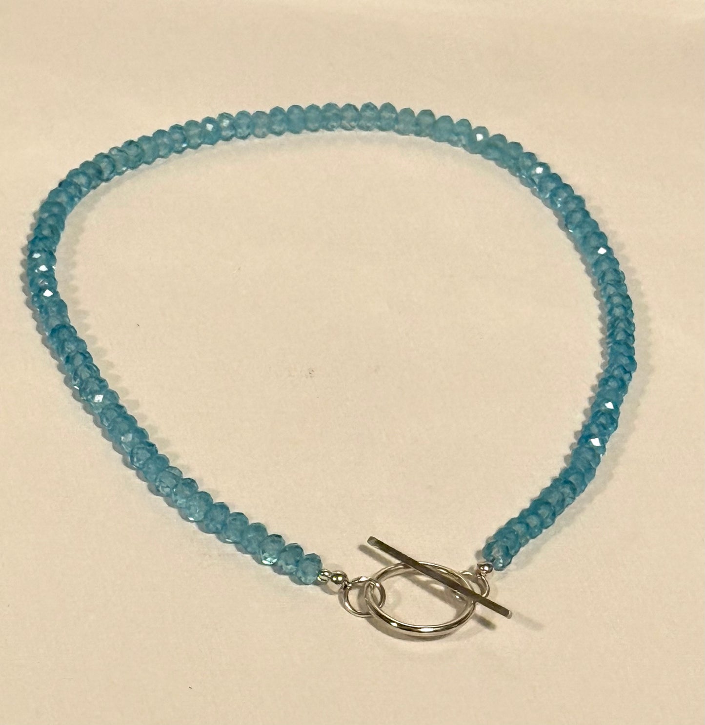 Blue Topaz necklace with silver T Bar