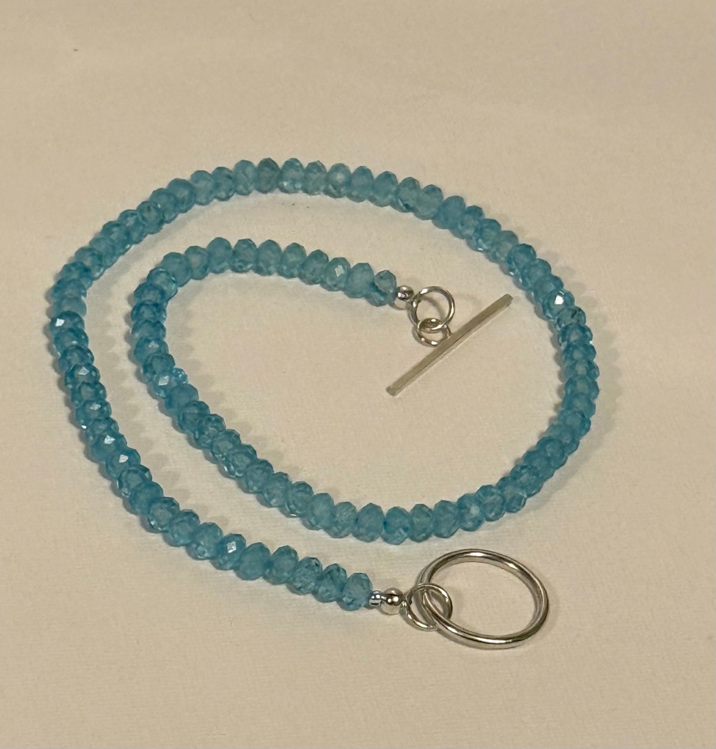 Blue Topaz necklace with silver T Bar