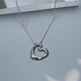 Solid Silver Molten Heart on a Silver Chain