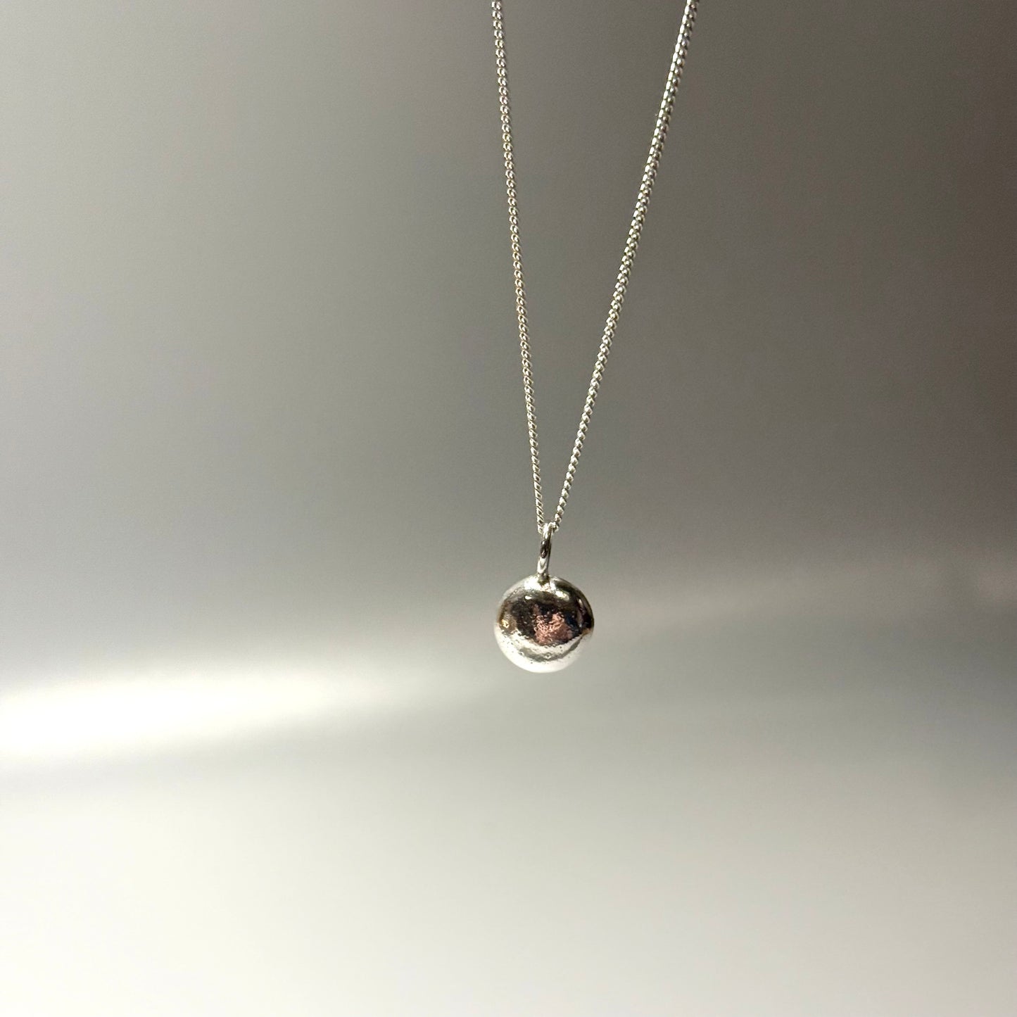 Molten Silver Pebble