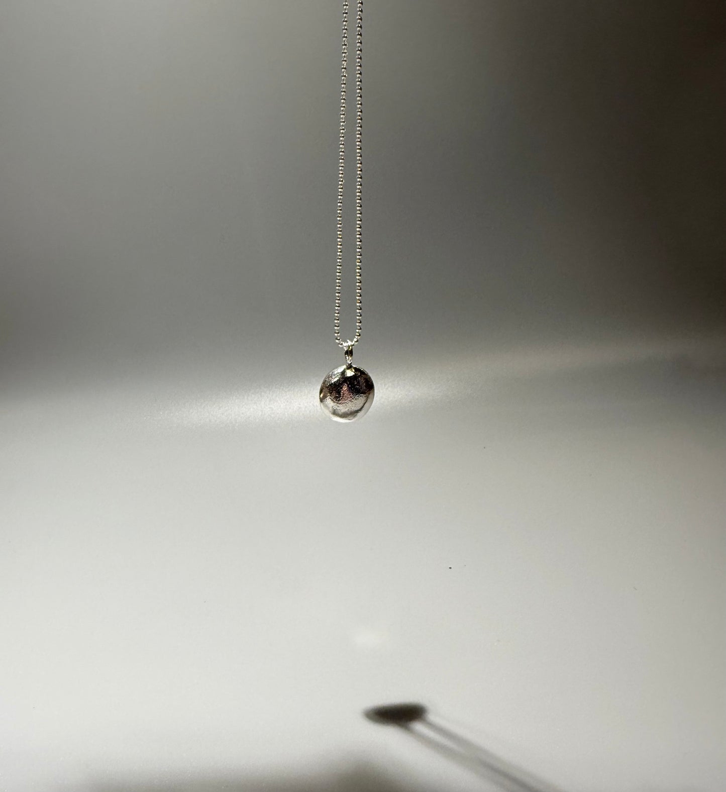 Molten Silver Pebble