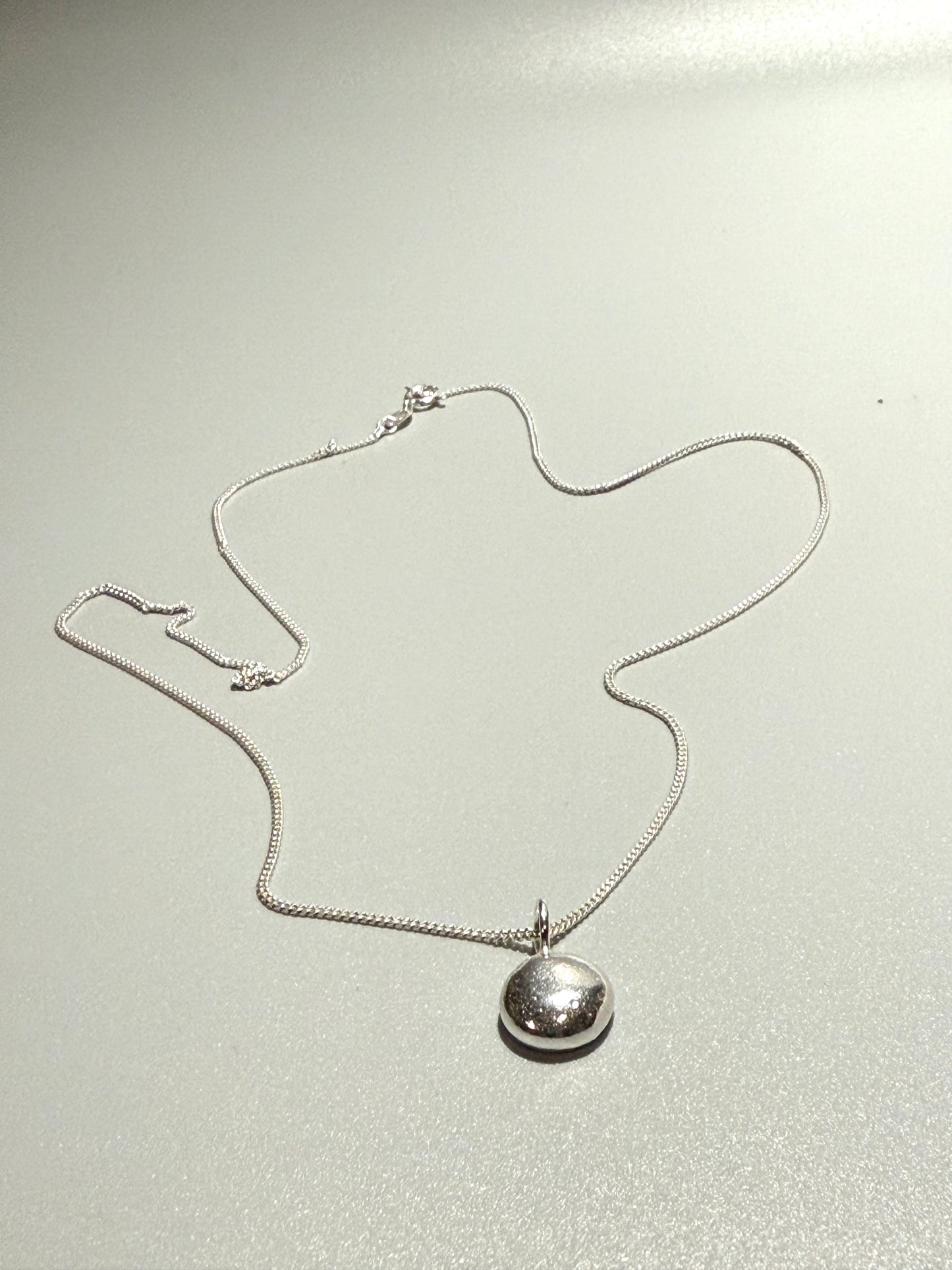 Molten Silver Pebble