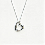 Solid Silver Molten Heart on a Silver Chain